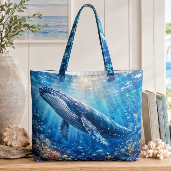 Whale illustrated on a zippered tote bag